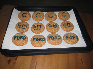 Illustration for article titled Not-So-Big Three Bake Sale Raises Enough To Fund CEO Salaries